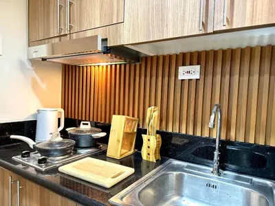 a kitchen with a sink and a counter top at SMDC Shore 3 Residences - One Bedroom Unit in Manila