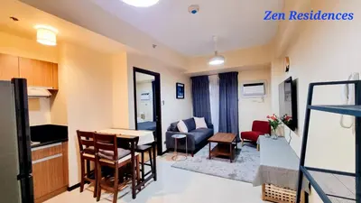 a room with a kitchen and a living room at Bliss by Zen Residences at The Radiance Manila Bay in Manila