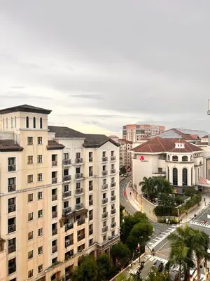 an aerial view of a city with buildings and a street at Elegant Condo Hotel across NAIA Airport Terminal 3 Newport City in Manila