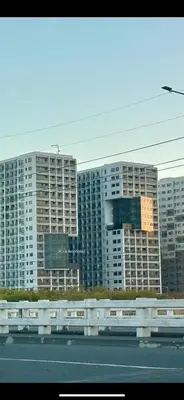 a view of some tall buildings in a city at Cozy Condo near Mall of Asia in Manila