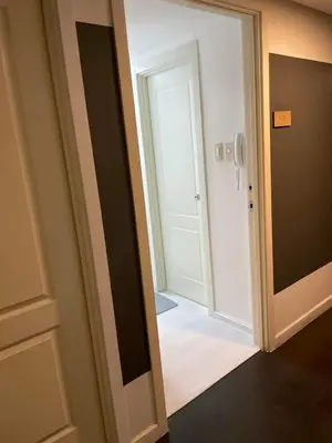 an open door leading to a room with a door at Azure Urban Resort Residences in Manila