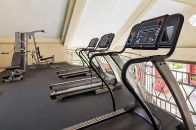 a row of treadmills in a gym at Brand New Studio in Pasig with Free Pool Access in Manila