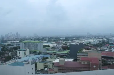 a view of a city from the top of a building at Pearl Manila Hotel in Manila