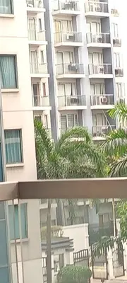 a view from the balcony of a building at Condotel in front of Terminal 3 in Manila