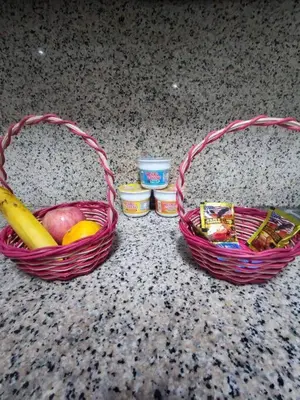 two baskets with food in them on a counter at Near Manila Airport, MAILZ HOMEZ COZY 2 Bedroom Condo, Full Kitchen, Swimming Pool, WIFI, 4R in Manila