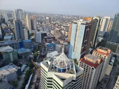 an aerial view of a city with tall buildings at UNIT 4765 AIR in Manila
