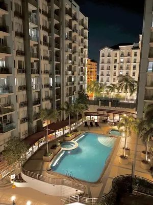 a large swimming pool in the middle of a building at Newport Hotel near NAIA Manila Airport Terminal Pasay in Manila