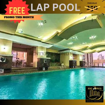 a large swimming pool in a hotel with a sign that reads lap pool at Near US Embassy x Free Unlimited POOL, MASSAGE & SAUNA Access x Promo This Month! Explore Deluxe Studio w Balcony in Manila Perfectly Situated Near NAIA Airport, Heart of Manila Updated 2025 Price for Your Unforgettable Ultimate Staycation Experience in Manila