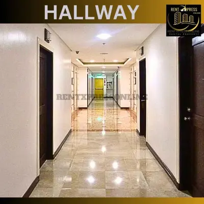 a hallway of a building with a sign that reads hall way at Near US Embassy x Free Unlimited POOL, MASSAGE & SAUNA Access x Promo This Month! Explore Deluxe Studio w Balcony in Manila Perfectly Situated Near NAIA Airport, Heart of Manila Updated 2025 Price for Your Unforgettable Ultimate Staycation Experience in Manila
