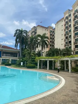 a large swimming pool in front of some buildings at RK Maisson Roiyale Pasig in Manila
