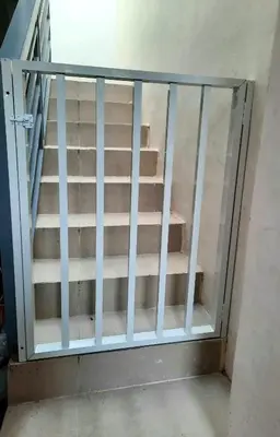 a glass door with stairs in a room at Mountain View in Binangonan