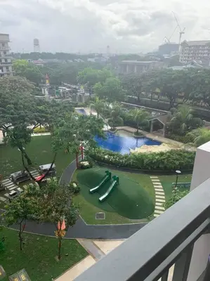 a view of a miniature golf course in a city at Stylish 2 Bedroom Condo Near BGC and Airport with Fast WiFi in Manila