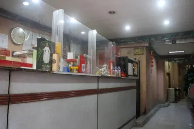 a bar in a restaurant with a counter top at OYO 1011 First Hotel in Manila