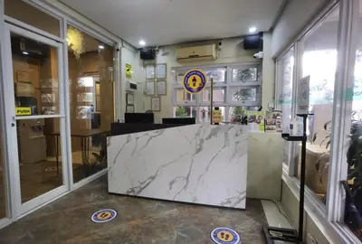 a store with a marble counter in a room at Sunny Day Residences Cainta in Cainta