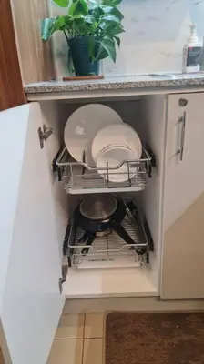a dishwasher in a kitchen with a plant in it at Affordable Condo in Makati w/ Wi-Fi, Netflix, Pool in Manila