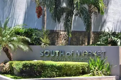 a sign for the south of miami private resort at South of Market near High Street BGC Classy & Stylish Studio, central location with city view in Manila
