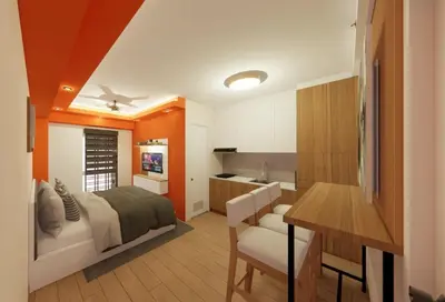a bedroom with a bed and a table and a kitchen at Near Manila Airport, MAILZ HOMEZ COZY Hotel Style Studio Condo, Avida Towers Sucat, Full Kitchen, Swimming Pool, WIFI, 5G in Manila