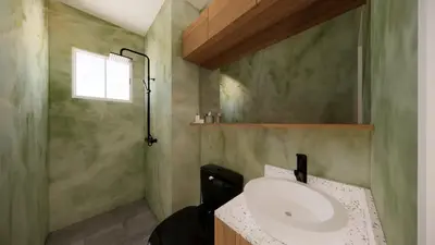 a bathroom with a sink and a mirror at Near Manila Airport, MAILZ HOMEZ COZY Hotel Style Studio Condo, Avida Towers Sucat, Full Kitchen, Swimming Pool, WIFI, 5G in Manila