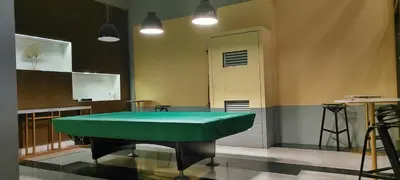 a green ping pong table in a room at The Radiance Manila Bay Studio 2 in Manila