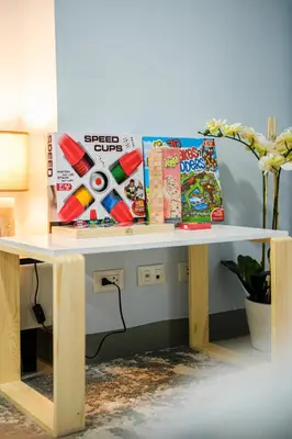a table with some snacks on top of it at Luxurious 2 Bedroom in Uptown BGC Taguig in Manila