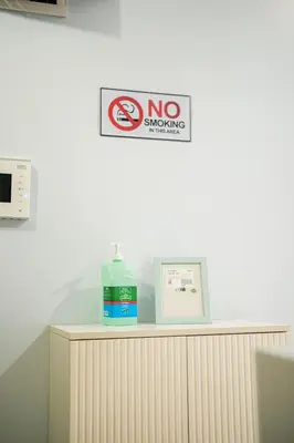 a no smoking sign above a counter in a room at Luxurious 2 Bedroom in Uptown BGC Taguig in Manila