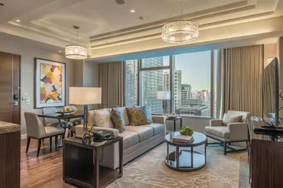 a living room with a couch and a table at Ascott Bonifacio Global City Manila in Manila
