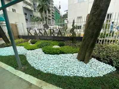 a rock garden in front of a building at Kasara Resort Condotel by Vhi in Manila