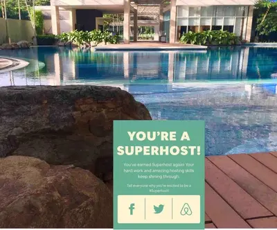 a sign that says youre a superhit in a swimming pool at Kasara Resort Condotel by Vhi in Manila