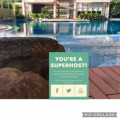 a sign that says youre a superhit in a swimming pool at Kasara Resort Condotel by Vhi in Manila