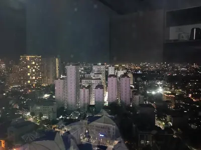 a view of a city at night with lights at K2K place in Manila