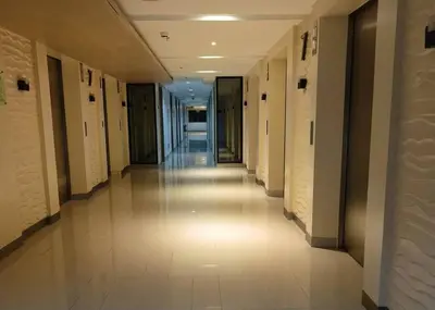 a hallway of a building with a long hallwayngth at Philippine International Convention Center 676 DYNASTEL SHORE in Manila