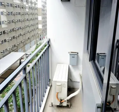 a white bench sitting on the side of a building at Philippine International Convention Center 676 DYNASTEL SHORE in Manila