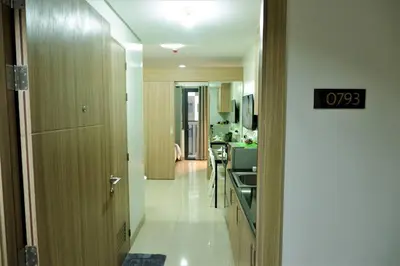 a kitchen with a sink and a counter top at CONDOTEL STAYCATION 793 Pasay DYNASTEL in Manila