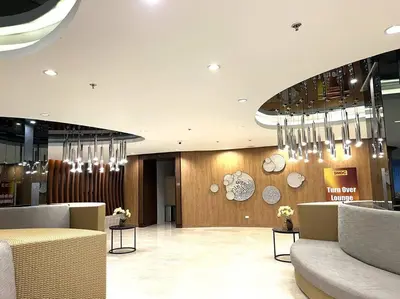 a lobby of a hotel with chandeliers at Pasay MOA 1486 Dynastel Shore Staycation in Manila