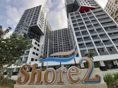 a sign for store in front of a building at Shore Residences 1576 Dynastel Staycation in Manila