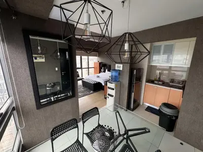 an aerial view of a kitchen and a living room at Modern Studio at NAIA Terminal 3 in Manila