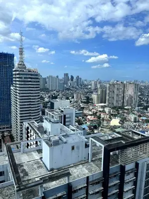 a view of a city from the top of a building at cozy studio unit at fame residence metro manila in Manila