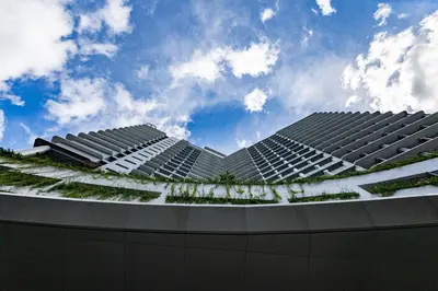 a view of a building with plants on it at Lush Residences Makati in Manila