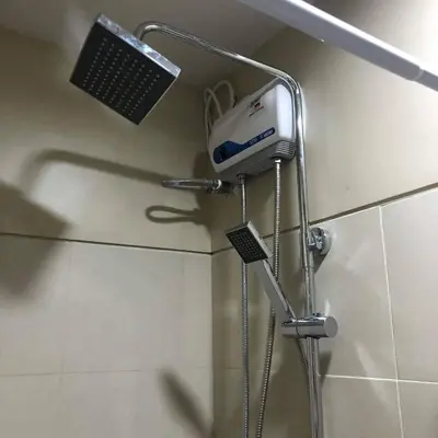a shower with a shower head in a bathroom at S Residence Condo Near MOA,IKEA in Manila