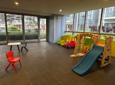 a play room with a slide and a playground at Airport NAIA Terminal 3 Insane Interior in Manila