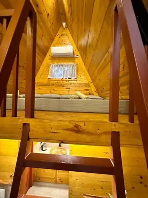 an overhead view of a room in a wooden cabin at CD NATUREVIEW in Matangtubig