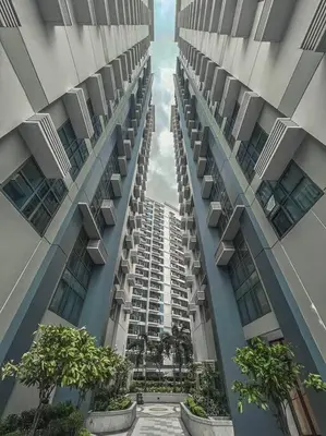 a view of a tall building from the inside at Condo Unit Viceroy Residences Mckinley Hill cd22b in Manila