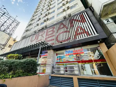 a store front of a tall building at Fancy Condo with Unli Wifi and Netflix in Manila