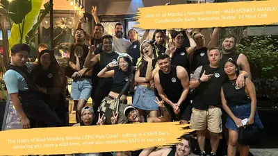a group of people posing for a picture at Mad Monkey Manila in Manila