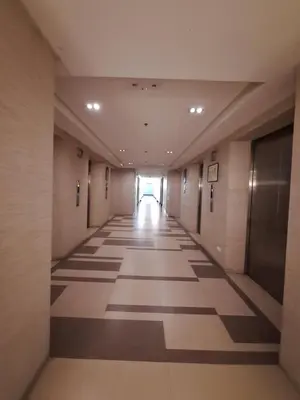 an empty hallway in a building with a hallway at Eastwood LeGrand 3 Cozy & Modern Studio Type Condominium in Manila