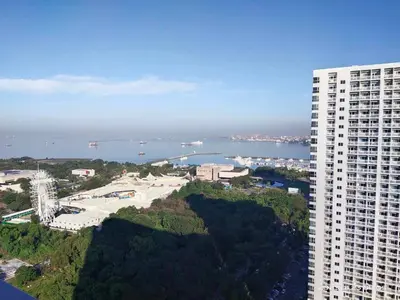 an aerial view of a large building and the water at G&M Comfy place for your stay at SMDC Coast Residences in Manila