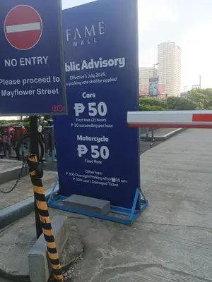a no entry sign on the side of a street at Cozy 1BR w/Wifi&Netflix in FAME near Shaw MRT in Manila