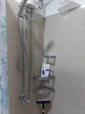 a shower in a bathroom with a shower at Little Lux Condo Shore 2-T3 Improved in Manila
