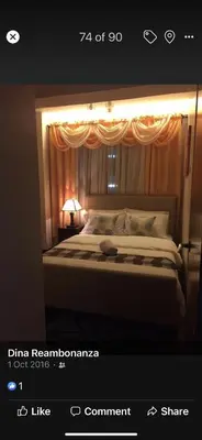 a bedroom with a large bed with a window at Montecito Luxury 1 bedroom condominium in Manila