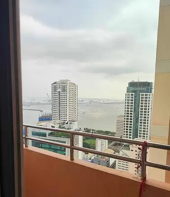 a view of a city from a balcony at FREE Pool n FREE Sauna Access OceanView Balcony in The Heart of Manila, Front of Robinsons Mall, Walking Distance to US Embassy Limited Slots x Secure Your Limited Offer This Month in Manila
